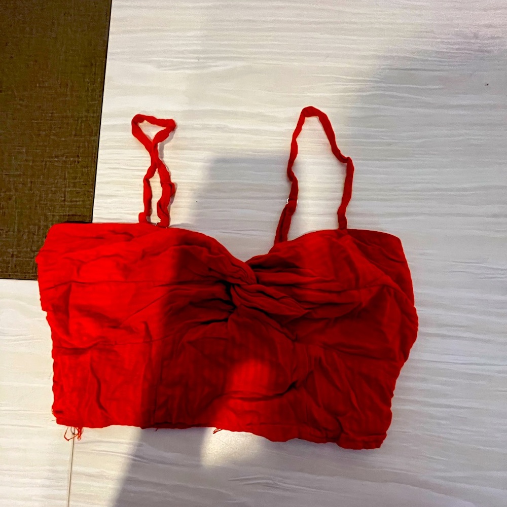 I’m getting rid of these tops because they’re not my style and they’re too small